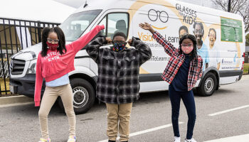 Charleston students in front of mobile clinic
