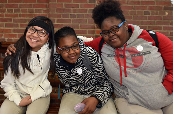 Friends with new glasses at Thomasboro Academy in Charlotte, April 25, 2018