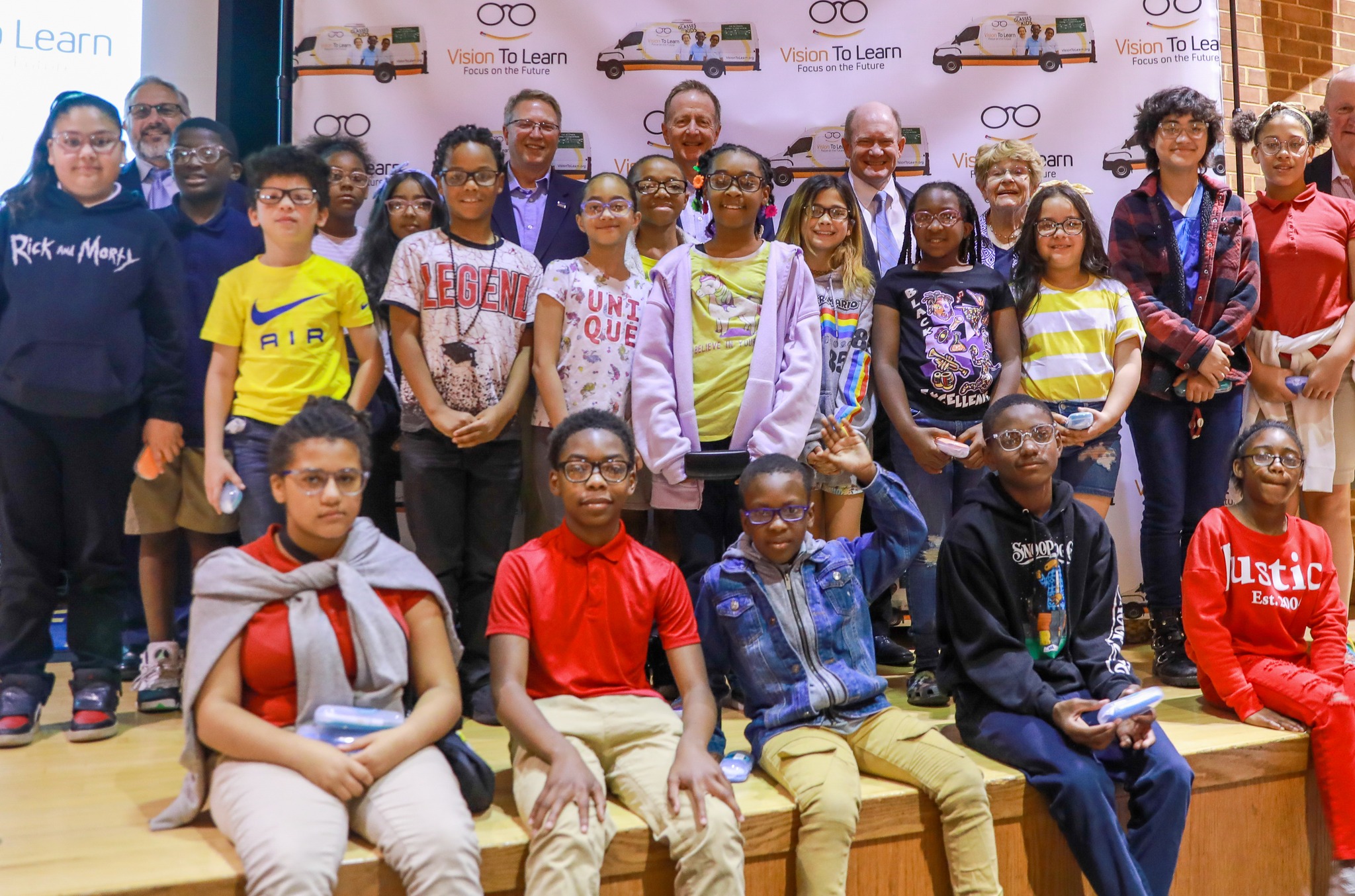 A group of elementary school students from The Bayard School at Pulaski in Delaware pose for a group picture.