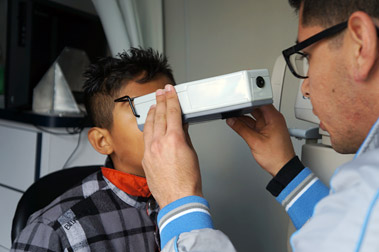 Student having eye exam