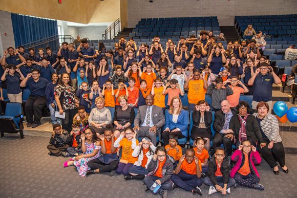 Frank R. Conwell Middle School and Primary School students show off their new glasses!