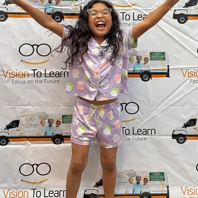 girl cheering her new glasses