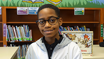 Grand Rapids student shows off new glasses