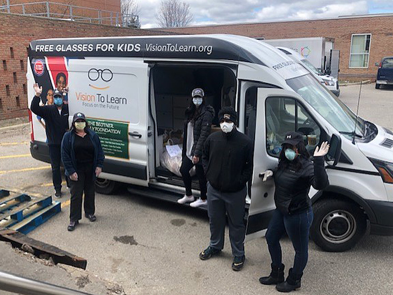 In Michigan, Vision To Learn staff set out deliver meals to families.