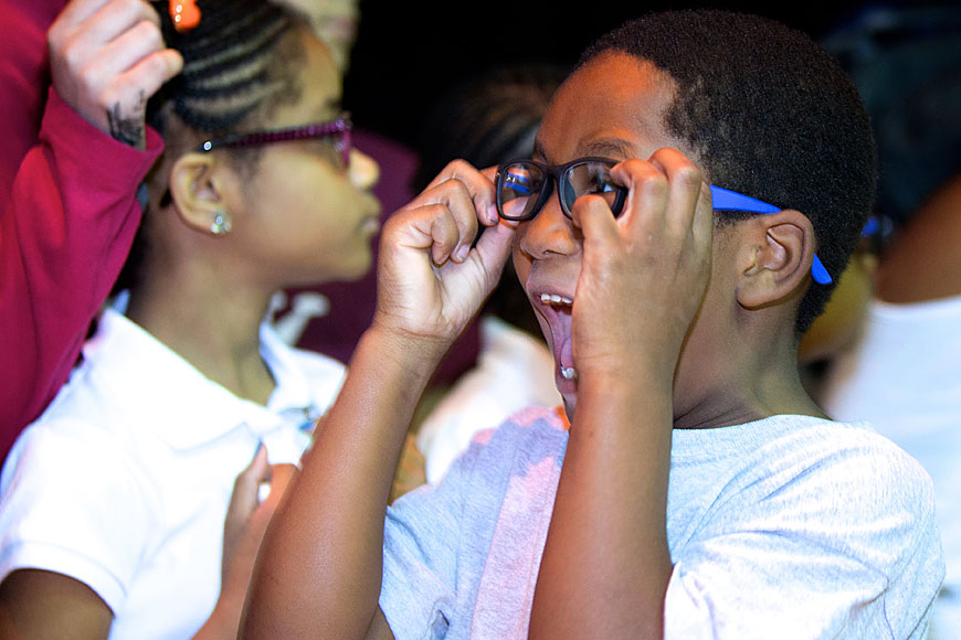 Boy show surprise at new glasses